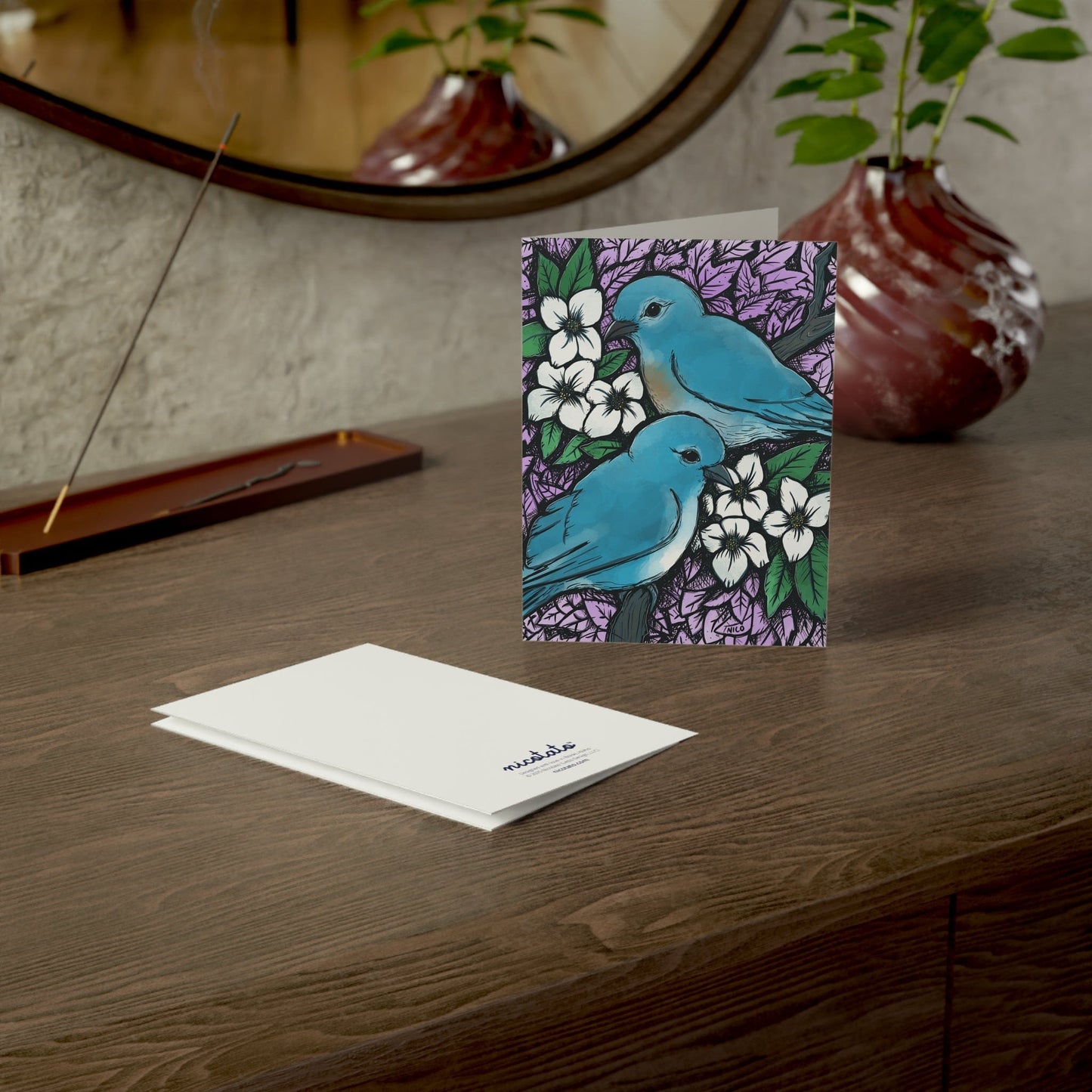 Idaho Mountain Bluebirds and Syringa Flowers
