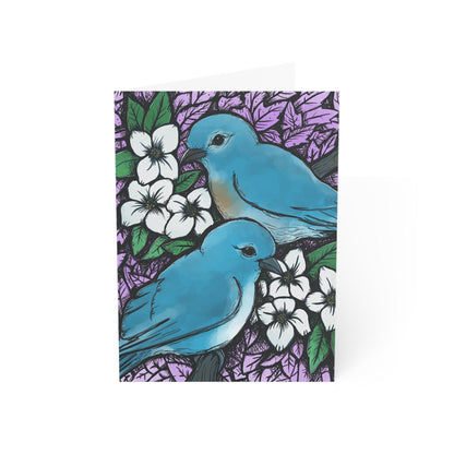 Idaho Mountain Bluebirds and Syringa Flowers