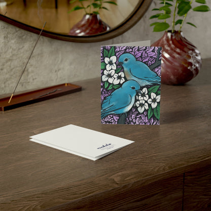Idaho Mountain Bluebirds and Syringa Flowers